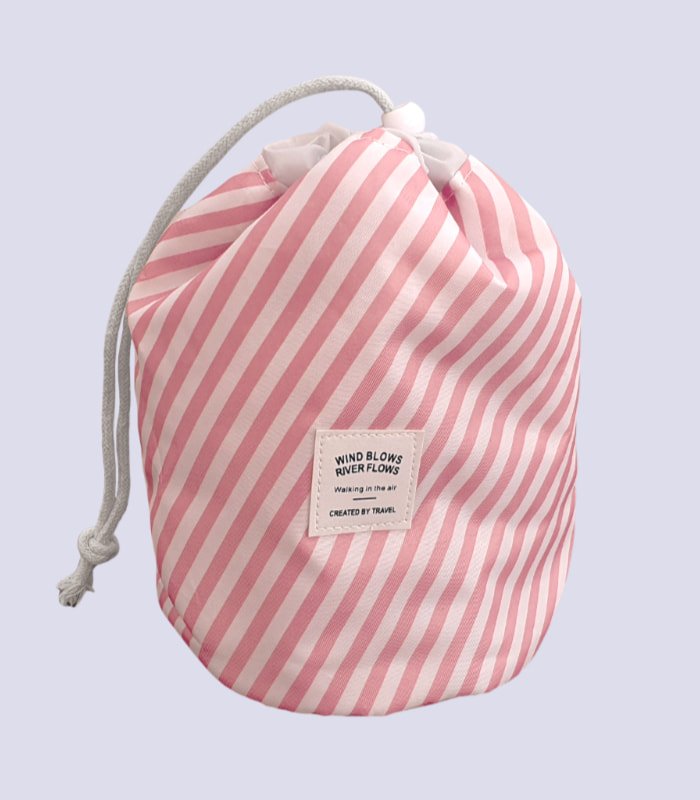 Trousse Voyagia de couleur rayée rose clair / crème